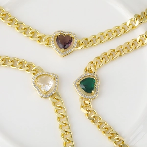 Gold plated cuban chain bracelets featuring heart shaped zirconia in purple, green and white