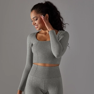 Detail of dark grey seamless ribbed yoga set featuring square neckline and high elastic fabric