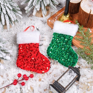 Sparkly sequin Christmas stockings with white faux fur trim in red and green festive colors