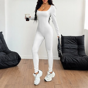 White high-stretch long sleeve yoga jumpsuit for women with slim-fit athletic design