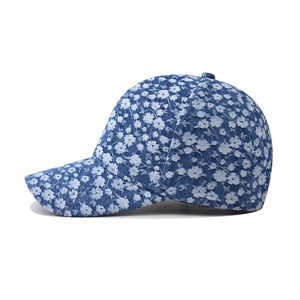 Thick denim baseball cap for men and women featuring white floral print and curved brim