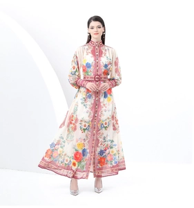 Close-up of lantern sleeves and wavy floral prints on a vintage stand-collar dress