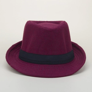 Detail showing high-quality stitching on dark purple wool fedora brim with black ribbon