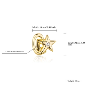 Detail of 14K gold plated star tooth cap with dimensions 13mm by 12mm and 1.34g weight