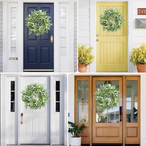 Artificial olive leaf and berry wreath shown on various front door colors and materials