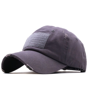 Distressed dark grey cotton baseball cap featuring American flag velcro patch and torn detail