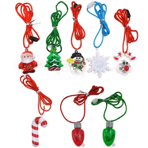 Close-up of assorted festive LED Christmas pendants including Santa and reindeer styles