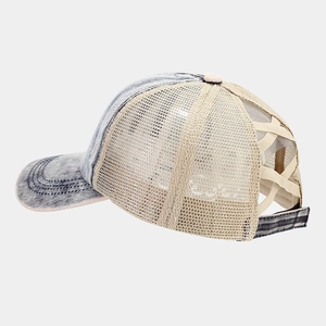 Detail of breathable mesh back and cross elastic straps for ponytail on baseball cap