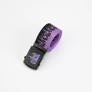 Detail of Harajuku style black canvas belt with purple flame print and metal buckle