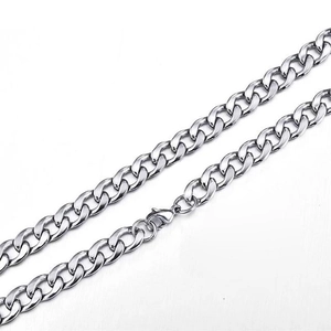 Detail of silver stainless steel Cuban link chain with a secure lobster clasp