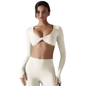 Women's slim fit V-neck crop top and high-waisted leggings yoga set in creamy white