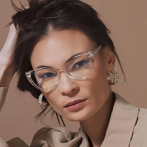 Fashionable cat-eye blue light blocking glasses with transparent frames on a female model