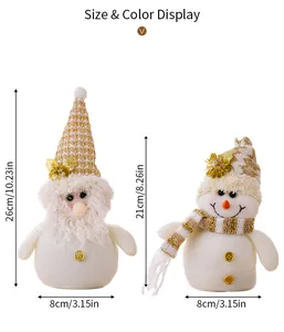Size display for plush Christmas snowman and gnome dolls with golden knit hats and scarves