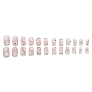 Lot de 24 faux ongles dégradé rose doux avec motifs marguerites blanches et billes dorées