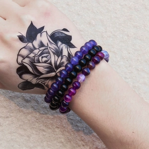 Three-piece stretch bead bracelet set with rose quartz, lapis, and agate on female model