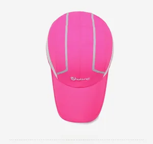Top view of rose pink quick-dry sports cap featuring silver reflective safety strips