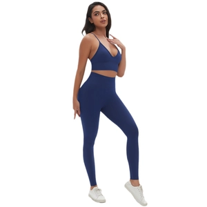 Nahtloses dunkelblaues Yoga-Set mit Sport-BH und Leggings mit hoher Taille für Fitness