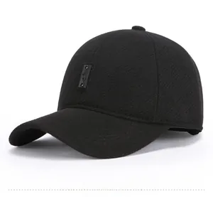 Detailed view of black wool winter baseball cap with textured fabric and sports patch