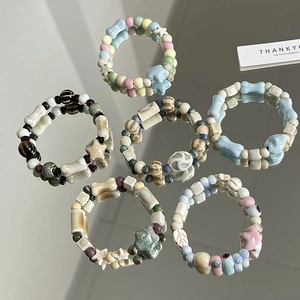 Set of 6 Jingdezhen ceramic beaded bracelets with star and irregular shapes in macaron colors