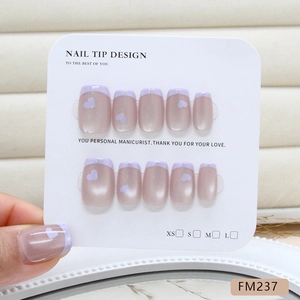 Handmade lavender French heart cat-eye press-on nails with a soft shimmering finish