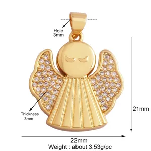 Golden angel pendant with cubic zirconia wings measuring 22mm by 21mm on white background