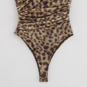 Women's leopard print bodysuit with waist ruching and high-cut fit in brown tones