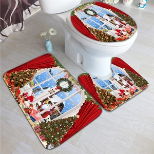 Three-piece Christmas bathroom mat set with Santa and reindeer motifs in a modern room
