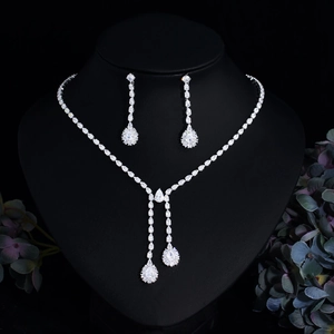 Silver teardrop bridal jewelry set with zircon necklace and earrings on mannequin