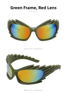 Detail of green punk sunglasses with layered wing frames and red mirrored lenses