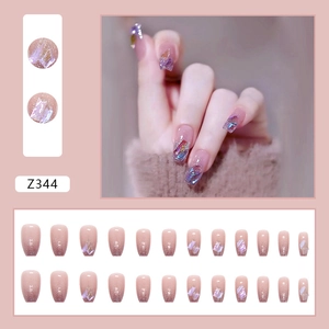 Short coffin press-on nails with aurora purple gradient and shell piece decorations