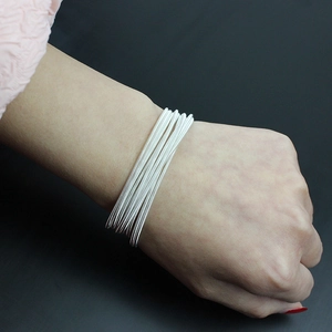 Multi-layer silver spring steel coil bracelet for women in minimalist flexible wire style