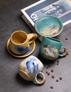 Artistic overhead view of three handmade ceramic coffee cups with twine-wrapped handles