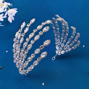 Luxury silver bridal headband with crystal wings and rhinestones for wedding hairstyling