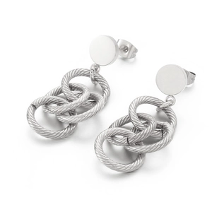 Boucles d'oreilles vintage en argent à anneaux torsadés pour femmes au fini métallique