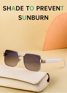 Modern rectangle sunglasses with silver frames and gradient lenses on a cream case
