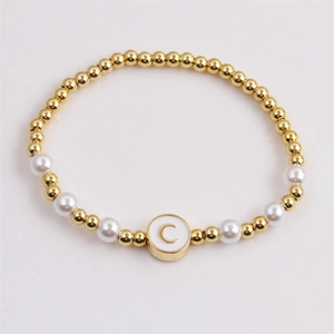 Fashionable beaded moon bracelet with golden beads, pearls and letter C charm