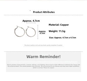 Silver geometric hoop earrings in copper, 4.7cm diameter, weighing 11.5g per pair