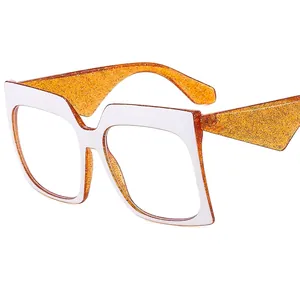 Oversized white square frame fashion glasses with sparkling orange glitter temples