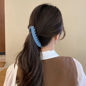 Matte blue large banana clip for elegant ponytail hairstyles with a textured finish