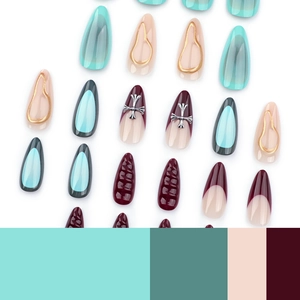 French almond press-on nails with silver cross accents and mixed solid colors