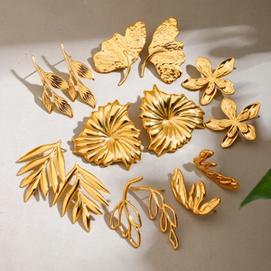 Set of 9 pairs of 18k gold plated stainless steel leaf and abstract stud earrings