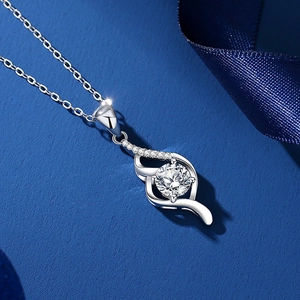 Elegant S925 sterling silver necklace featuring a 1-carat moissanite pendant on blue silk