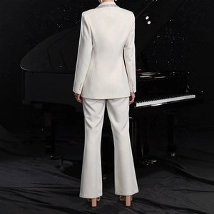 Elegant white slim fit blazer and trousers set with rhinestone details on back view