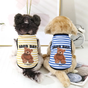 Detail of breathable striped pet vests featuring cute cartoon bears and mesh fabric textures