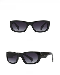 Front and side view of square black sunglasses with gray gradient lenses and rivet detail