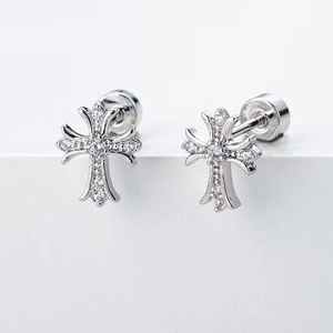 Exquisite silver cross stud earrings with sparkling white crystals and screw back design