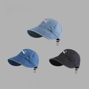 Three embroidered bow denim baseball caps in light blue, dark blue, and charcoal black