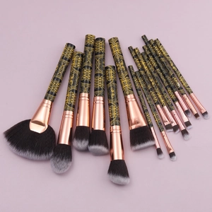 Professional 15-piece black and gold makeup brush set with rose gold metal ferrules
