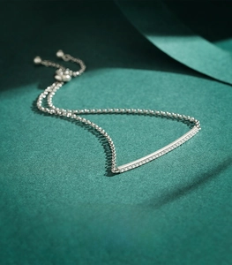 Detail of S925 sterling silver bar bracelet with zircon pavé and adjustable sliding clasp
