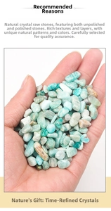 Close-up of polished natural amazonite stones held in hand for size and texture detail